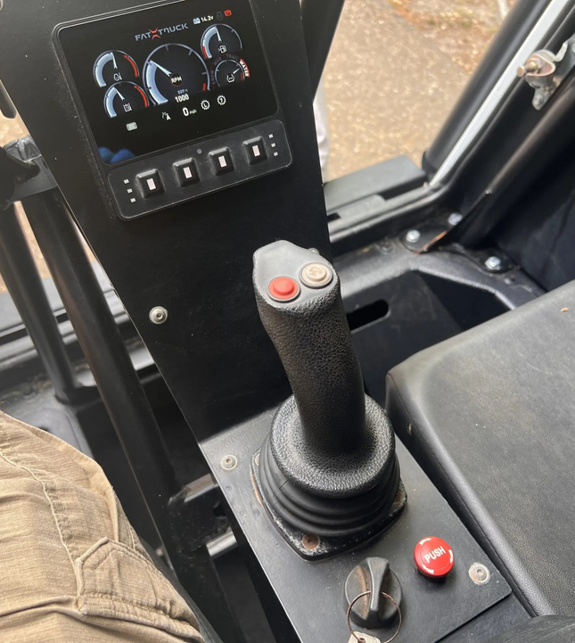 Image of joystick used to control a truck